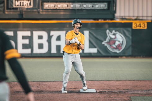 Player celebrates on base.