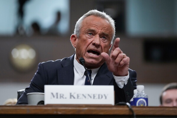 Robert F. Kennedy Jr., President Donald Trump's choice to be Secretary of Health and Human Services, appears before the Senate Finance Committee for his confirmation hearing, at the Capitol in Washington, Jan. 29, 2025. (AP Photo/Ben Curtis, file)