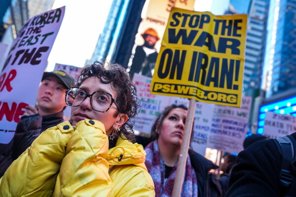 People march while taking part in a protest against the U.S.-Israeli war with Iran, and against conflict in Lebanon, Wednesday, April 8, 2026, in New York. (AP Photo/Ryan Murphy, File)