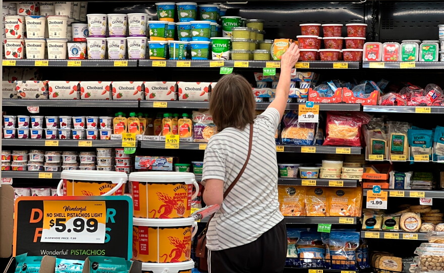 A customer looks at items at a Grocery Outlet store in Pleasanton, Calif.,. on Sept. 15, 2022.