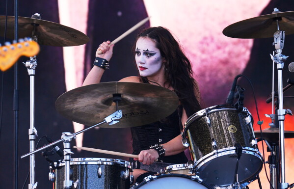 Drummer Chloe de St. Aubin of Die Spitz performs at the Daisy Chain Fields Music Festival on Saturday, Aug. 29, 2026, at Great Park in Irvine, Calif. (AP Photo/Chris Pizzello)