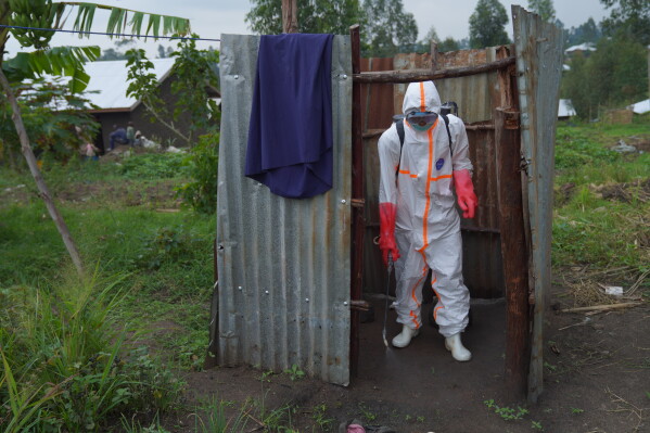 Wiza Bondele, a health worker on the prevention and control team, seen at work in Ituri province, eastern Congo, Wednesday, Aug 5, 2026. (AP Photo/Dieudonne Dirole)