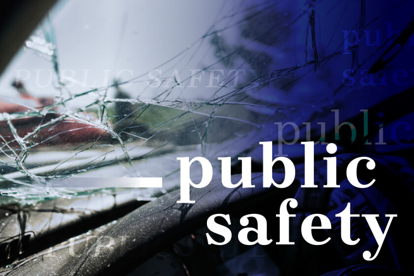 A cracked windshield with "public safety" superimposed on the image.