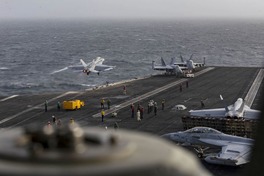 An F/A-18F Super Hornet launches from the flight deck of the USS Abraham Lincoln on July 31.
