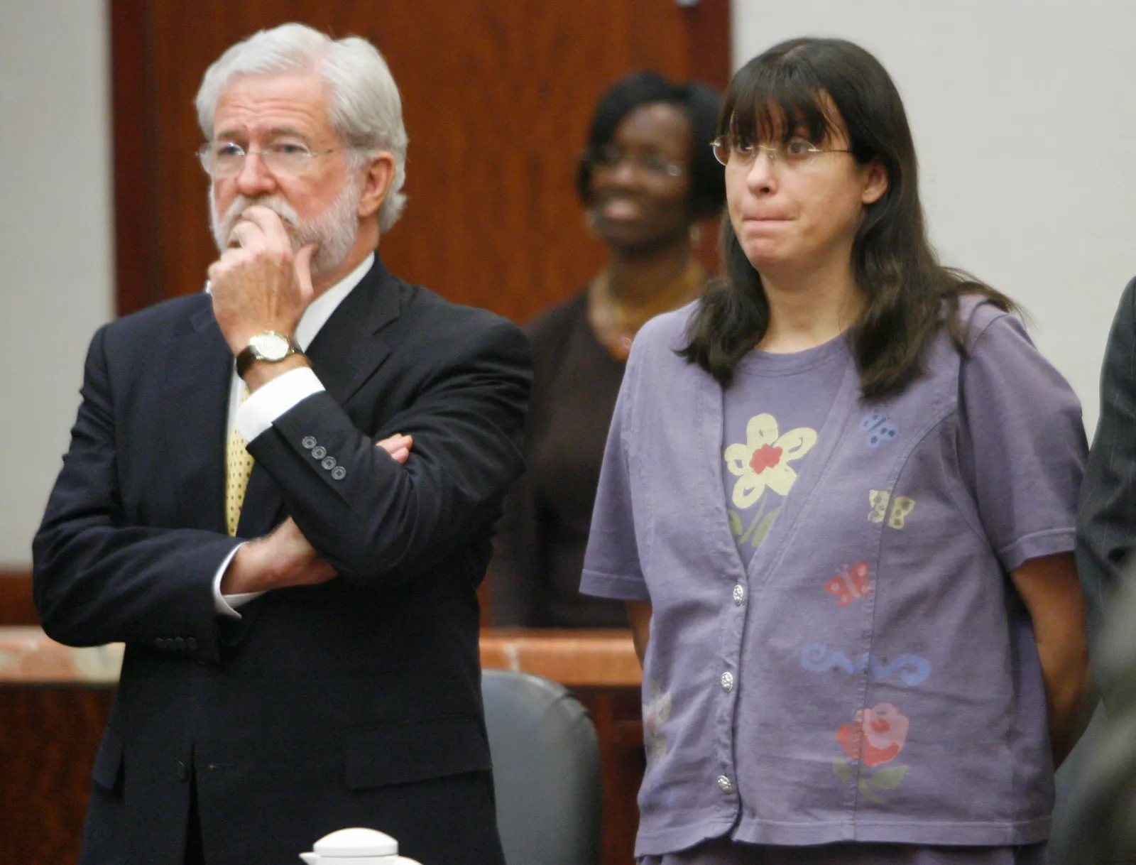 File - In this July 26, 2006 file photo, Andrea Yates, right, and her lawyer George Parnham stand as the verdict in her murder retrial for drowning her five children is read in Houston. | AP Photo/Brett Coomer, Pool, file