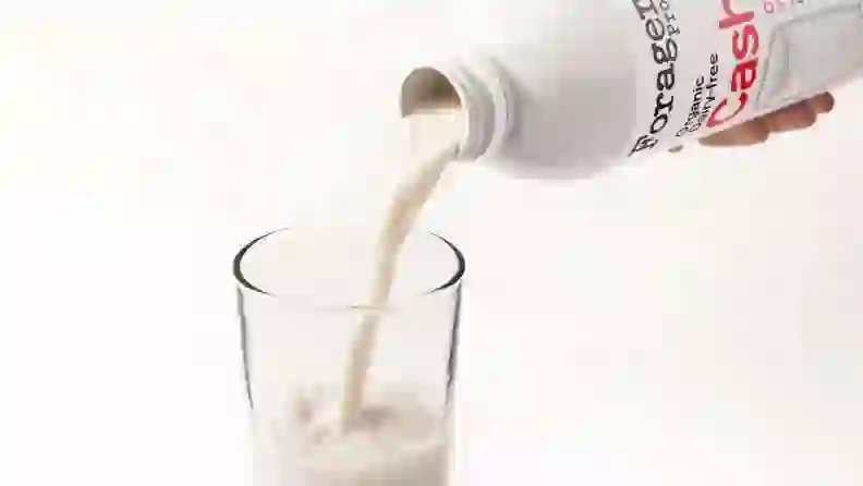 Forager cashew milk pouring into a glass