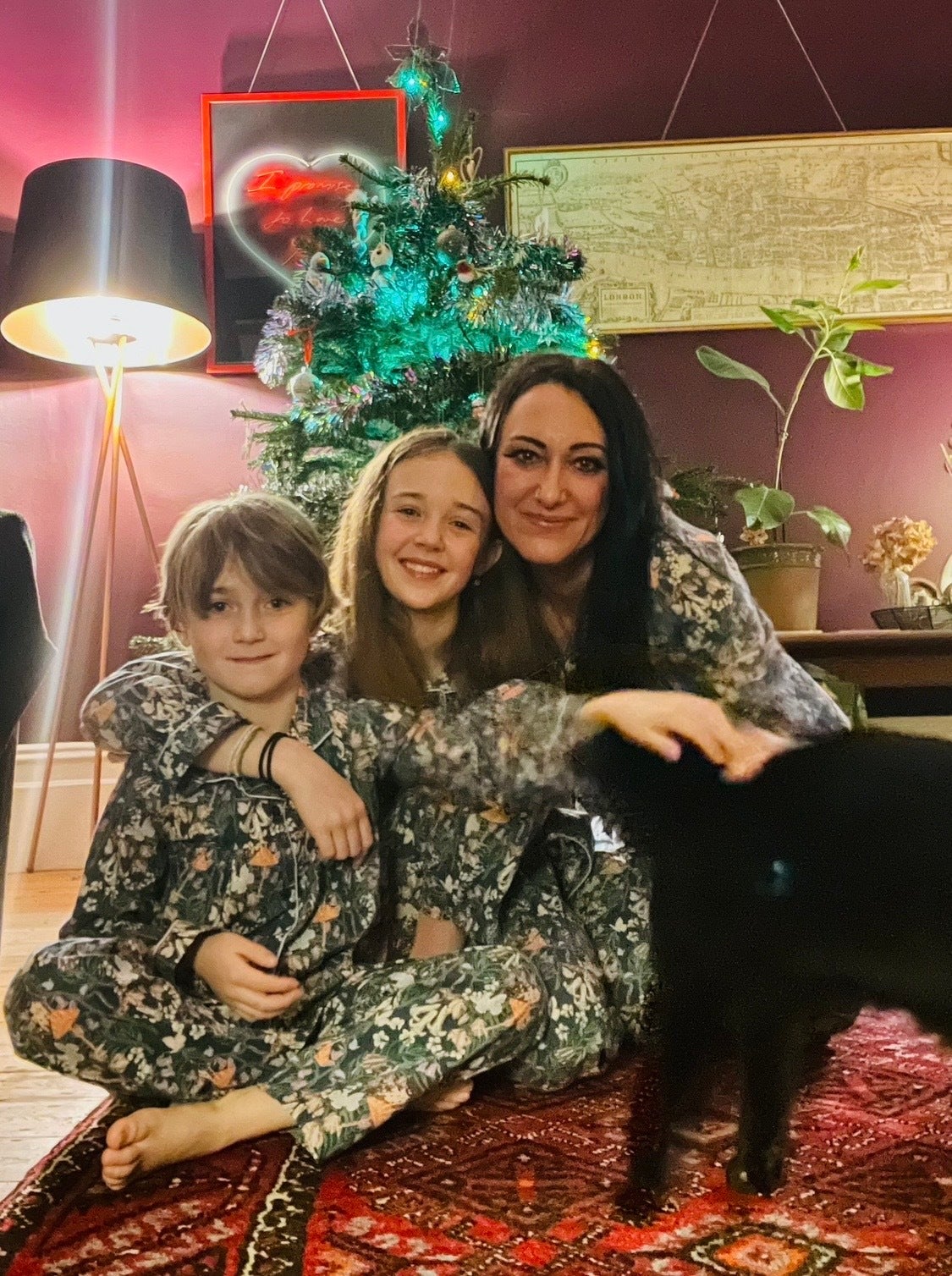 Victoria with her children and their beloved 16-year-old cat, China – a united family of four taking a modern approach to longevity and pet care