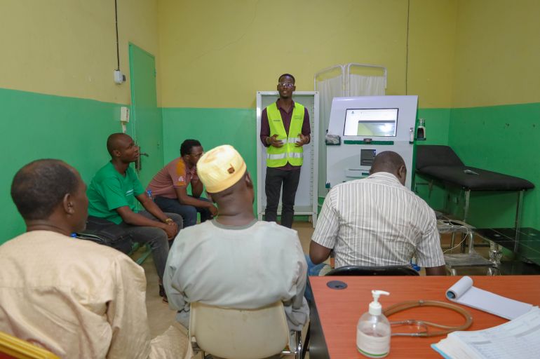A Telemedan solar-powered kiosk helps patients in rural Chad access doctors remotely, reducing the need to travel long distances for medical care [Yahuza Bawage/ Al Jazeera]
