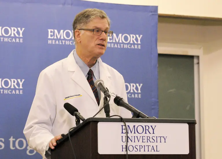 Bruce Ribner standing at an Emory University Hospital podium