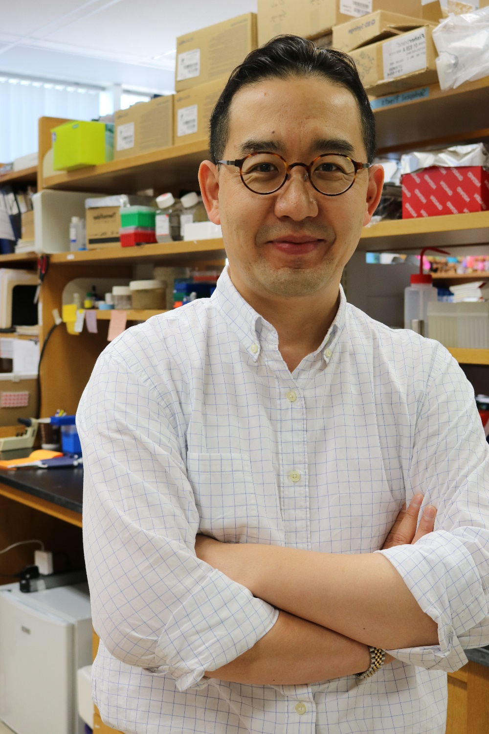 Photo of Minsoo Kim in his lab.