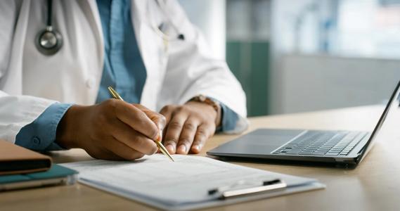 Physician filling out survey