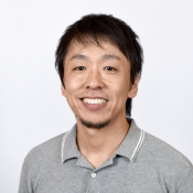 headshot of Taichi Suzuki