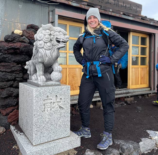 A reviewer wearing the pants on a hike
