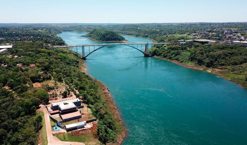 The Friendship Bridge spans over the Parana river along the border of Brazil, right, with Paraguay, left, Wednesday, Oct. 13, 2021.