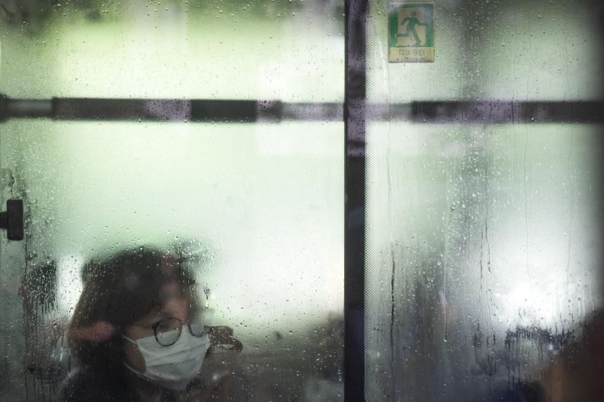 A woman wearing a face mask in Beijing on July 12, 2022.