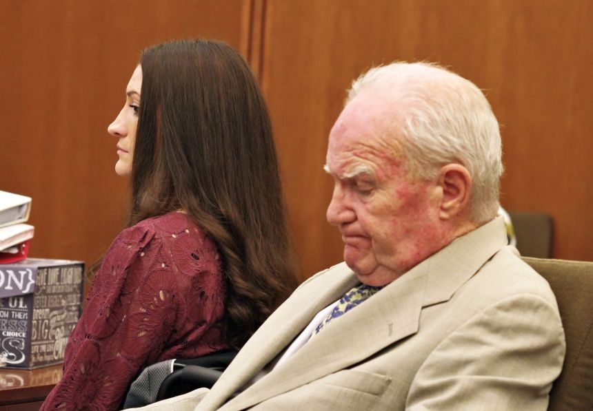 Lindsay Clancy, left, and her lawyer Kevin Reddington sit at the defense table after Reddington objected to a line of testimony on Friday.