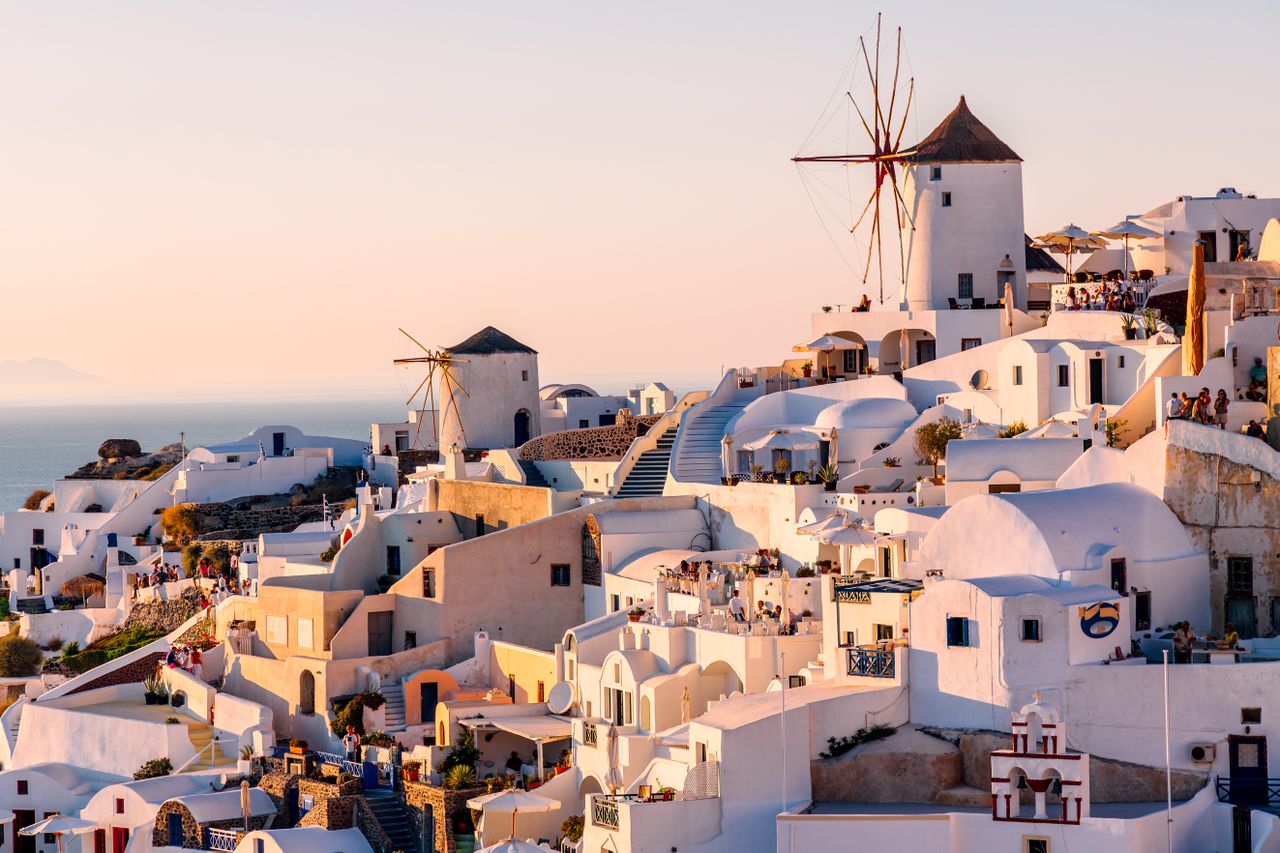 Greek islands are dotted with charming towns like Oia village.Credit: Alexander Spatari / Getty Images