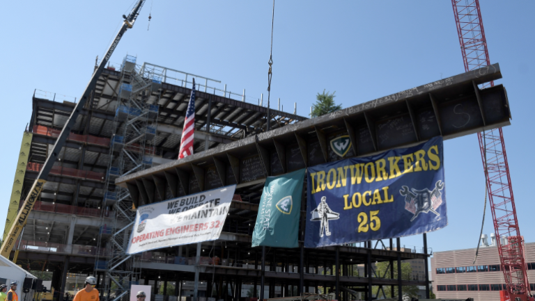 Wayne State University celebrates major construction milestone with Health Sciences Research Building steel topping