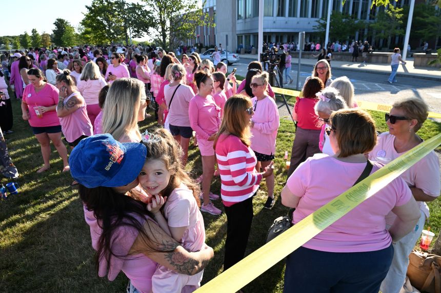 Hundreds of women gathered outside the courthouse where Clancy is standing trial on Thursday.