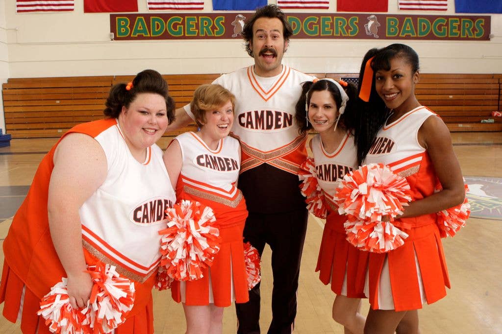 Chrissy Metz in a cheerleading costume with the cast of My Name is Earl