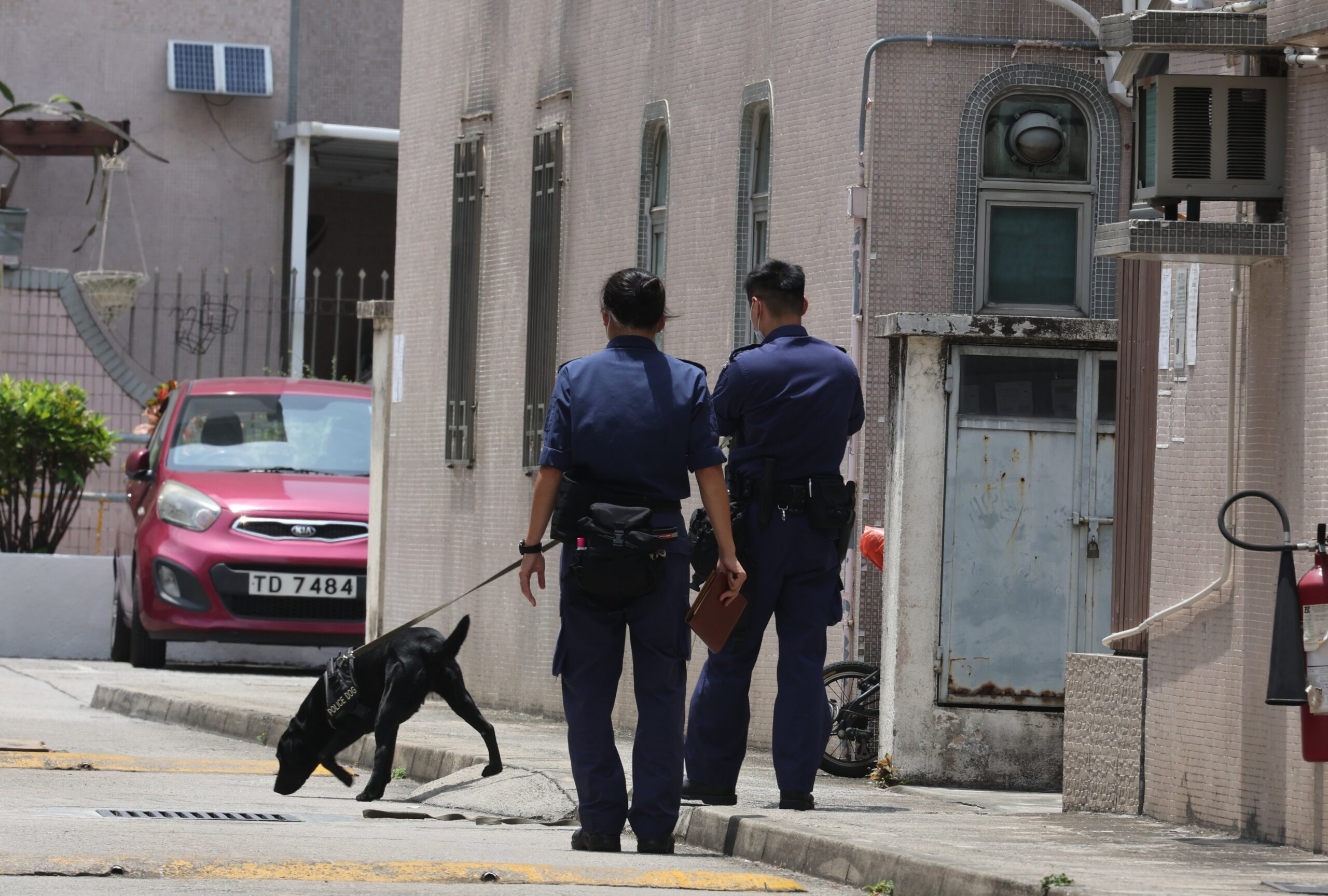 Police officers at the crime scene at Tin Ha Road in late April 2022. Photo: Edmond So