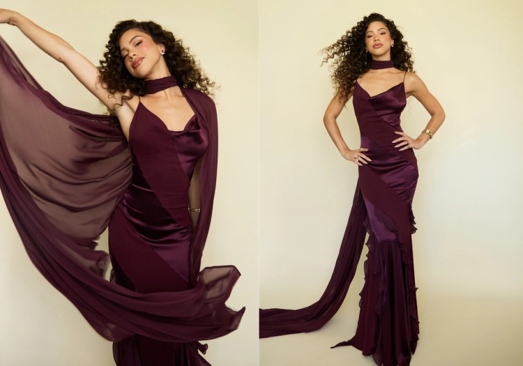 Kiara Romero poses in two side-by-side portraits wearing a deep plum satin gown with a flowing sheer scarf and voluminous curls.