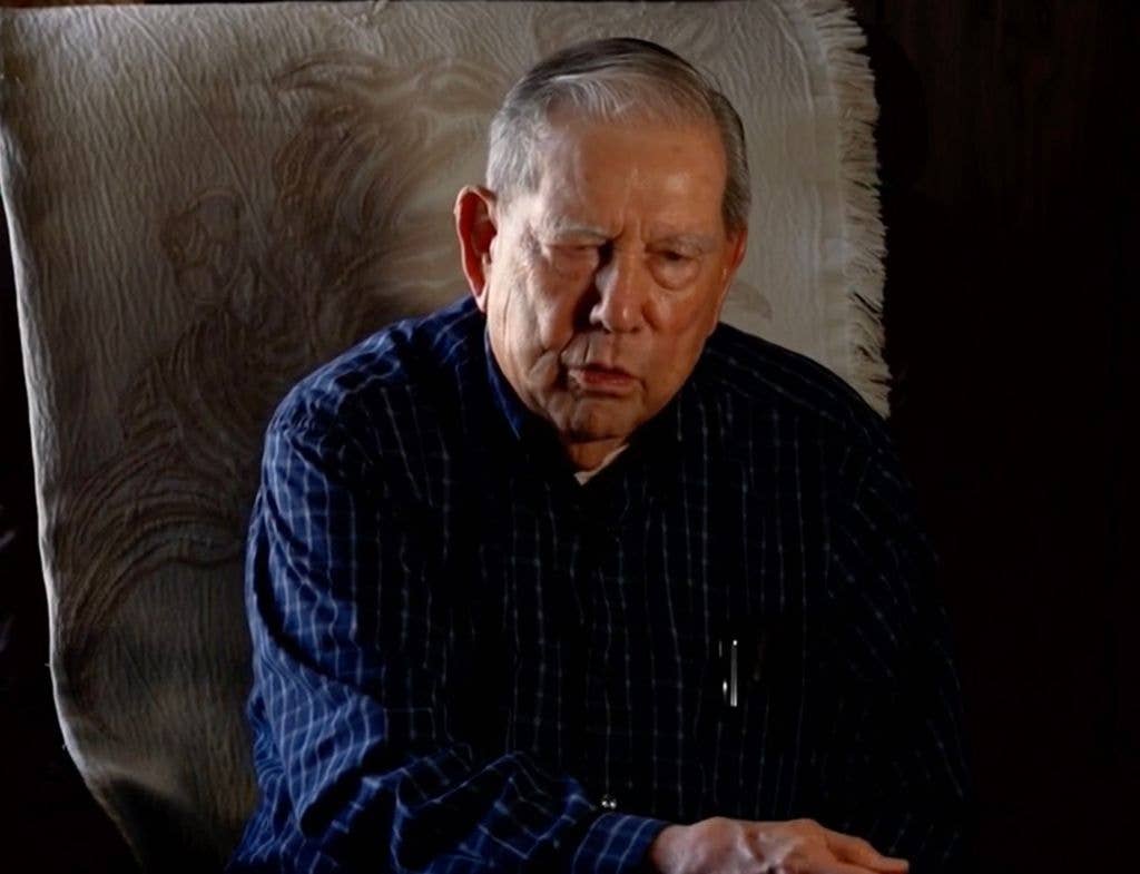 John Carroll sitting down for an interview