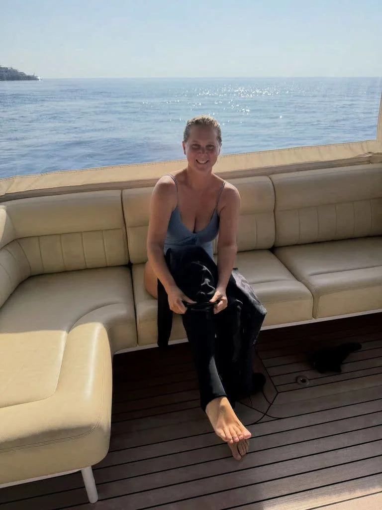Amy on a boat getting ready for her dive experience