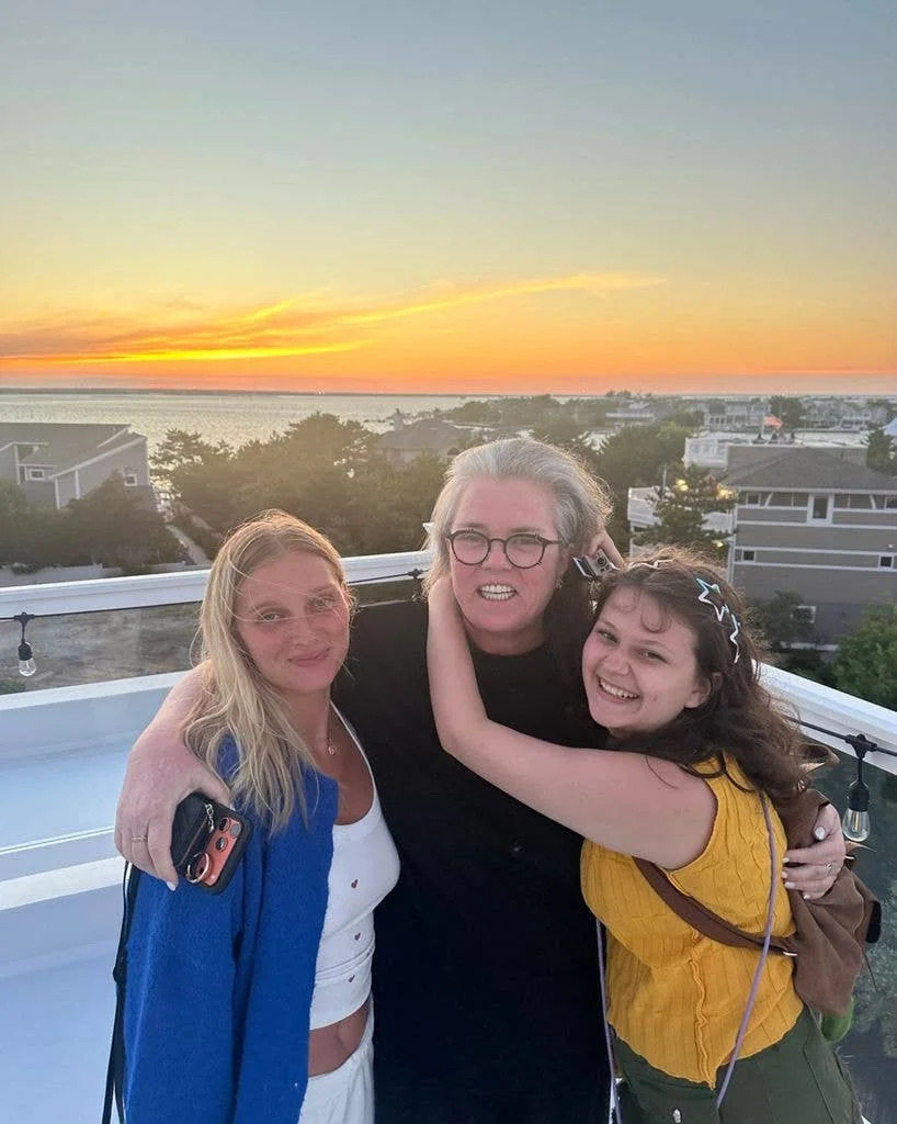 Rosie O'Donnell (C) poses on vacation with daughters Vivi (L) and Clay at the Jersey Shore