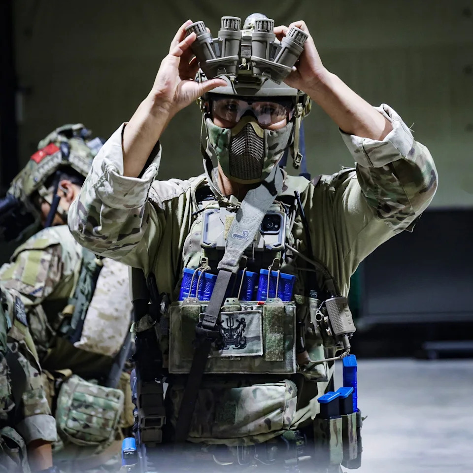 Commandos and Korean forces prepare to conduct an amphibious raid exercise at night