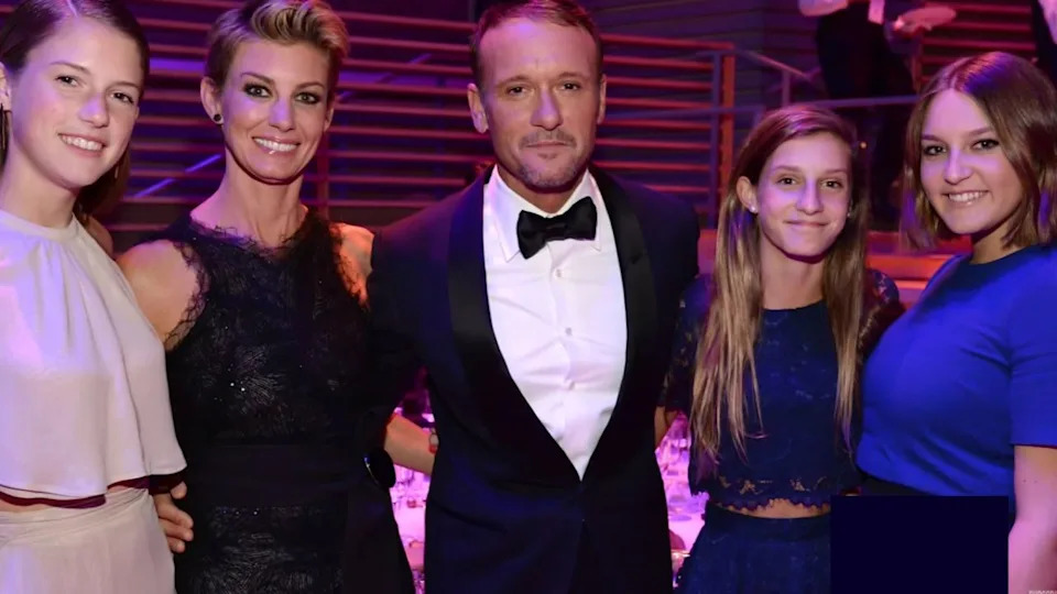 Gracie photographed with parents, Tim and Faith, and sisters, Audrey and Maggie