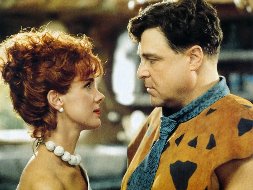 Other fans shared their favorite projects Goodman has starred in, including 1987's "Raising Arizona," 2001's "Monsters, Inc." and 1994's "The Flintstones" (with Goodman and co-star Elizabeth Perkins seen in a still from the latter film here). ©Universal/Courtesy Everett Collection