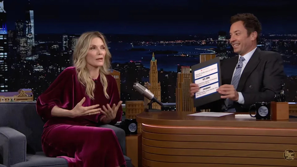 Jimmy Kimmel displayed headlines as proof to Michelle Pfeiffer. / YouTube/Jimmy Kimmel Live