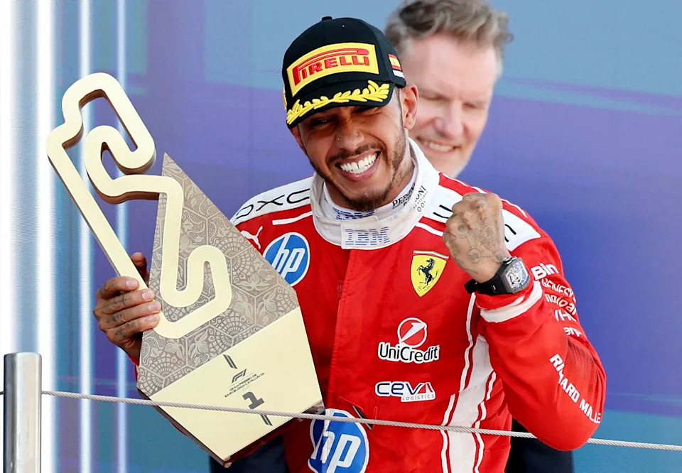 Lewis Hamilton with his trophy after winning the Barcelona-Catalunya Grand Prix on June 14, 2026. / Nacho Doce/Reuters