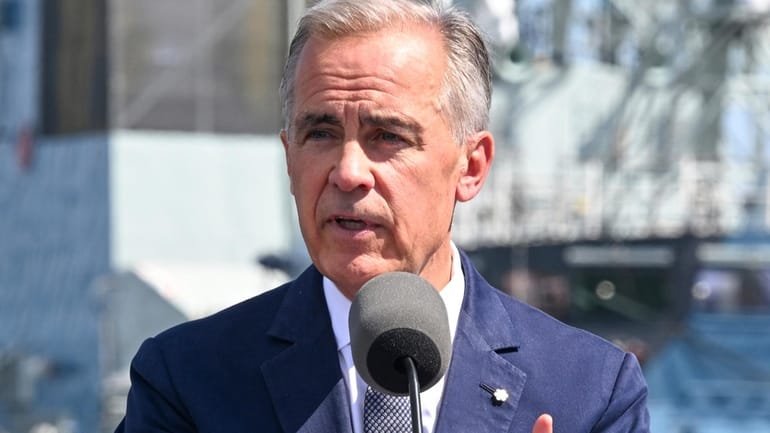 Canadian Prime Minister Mark Carney speaks at the Davie shipyard...