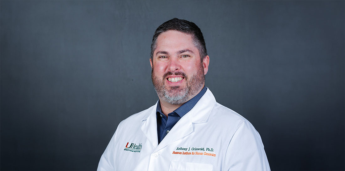 Dr. Anthony Griswold, in white clinic coat