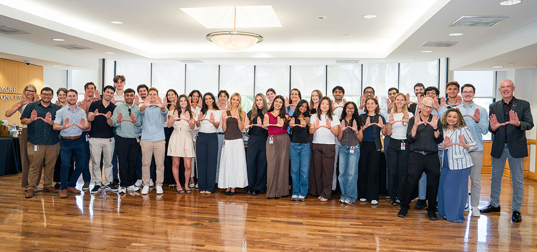 Members of the Class of 2030 M.D./M.B.A. cohort, faculty, and program leaders pose for a group photo during orientation.