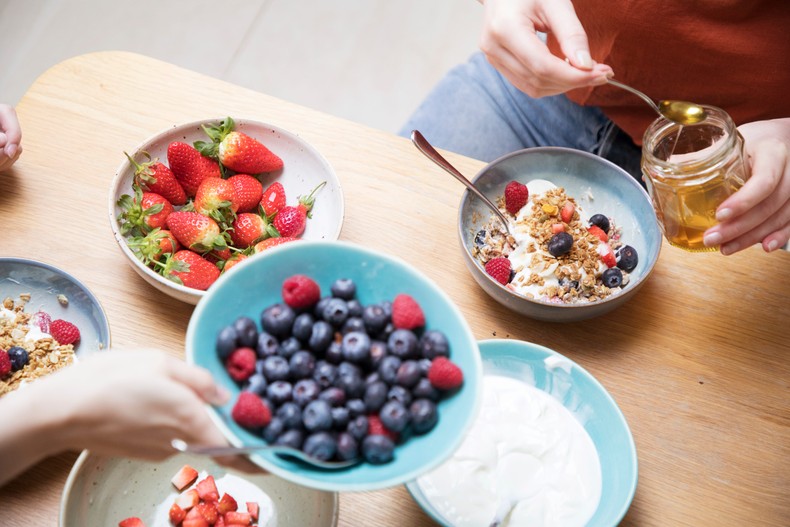 Breakfasting on yogurt, berries, and oats instead of bacon and white bread may help cut cancer risk.Betsie Van der Meer/Getty Images
