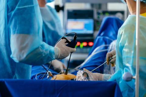 surgeons performing laparoscopic surgery