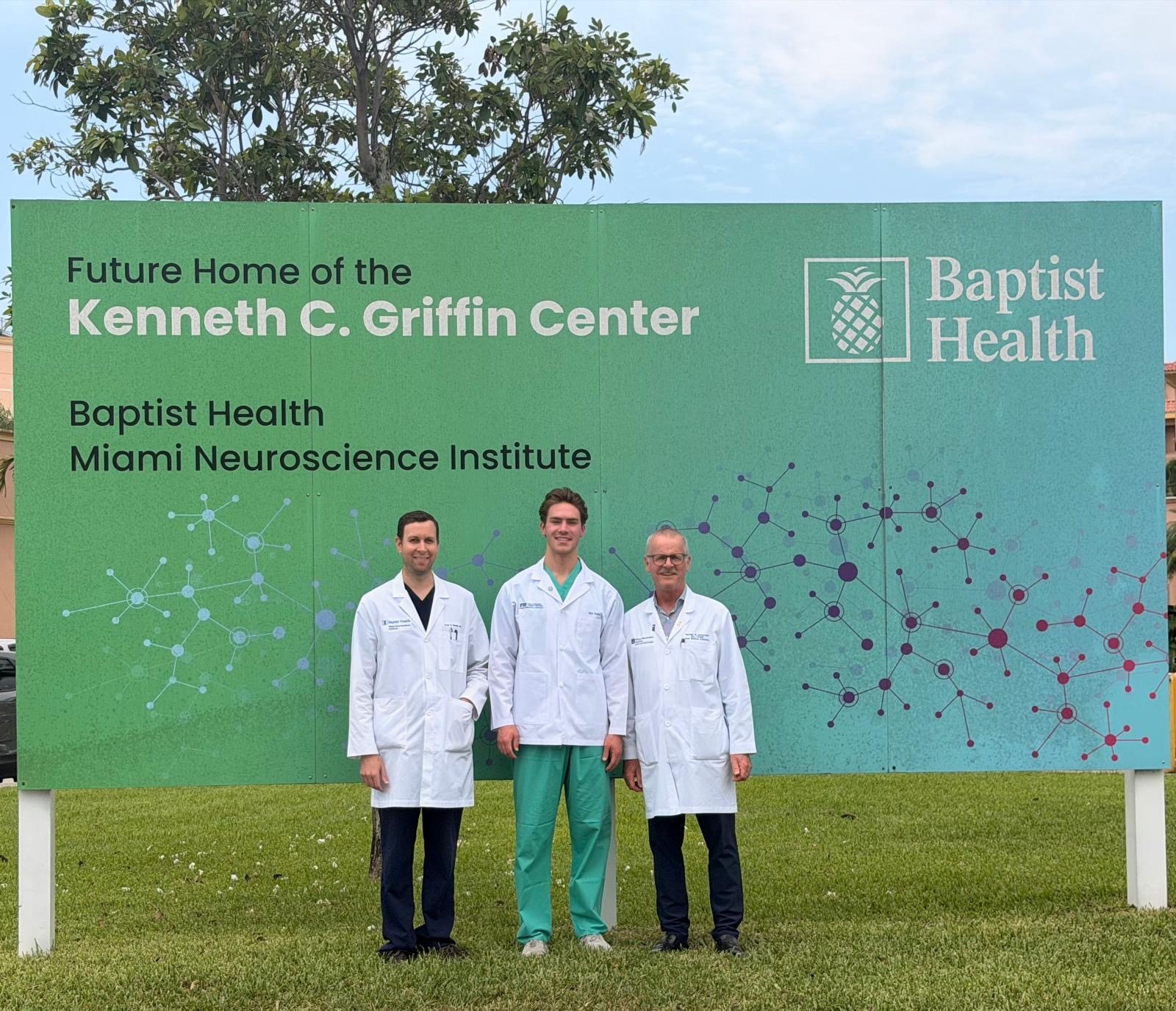 Medical student Eric Kunz (center) with Baptist Health physicians and mentors Drs. Evan Bander and Michael McDermott