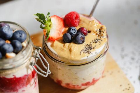 Overnight oats topped with peanut butter, fruit and chia seeds