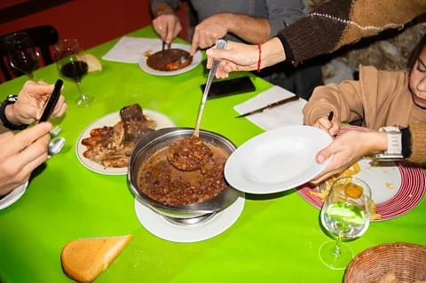 Getty Images Eating dinner earlier can change how our bodies metabolise the food (Credit: Getty Images)