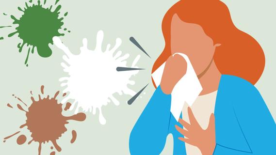 Person coughing mucus into a tissue