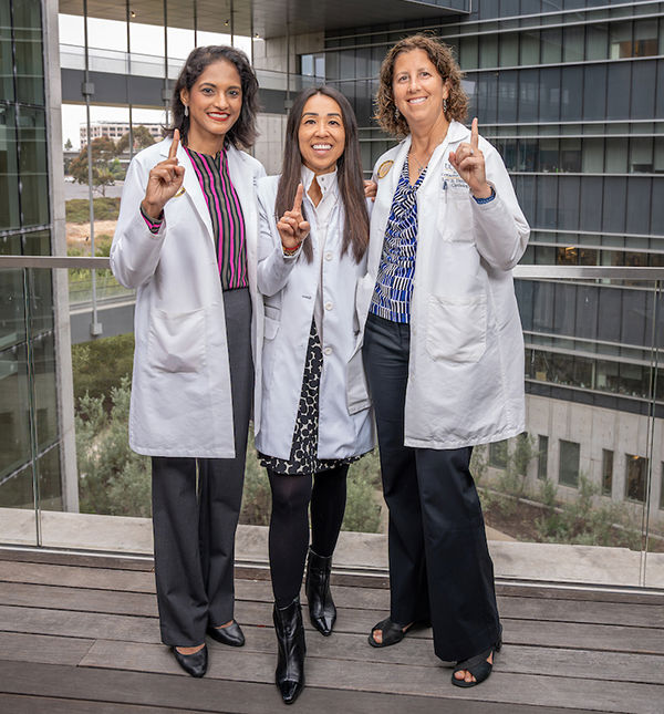 Drs. Taub, Shen and Daniels outside Jacobs Medical Center.
