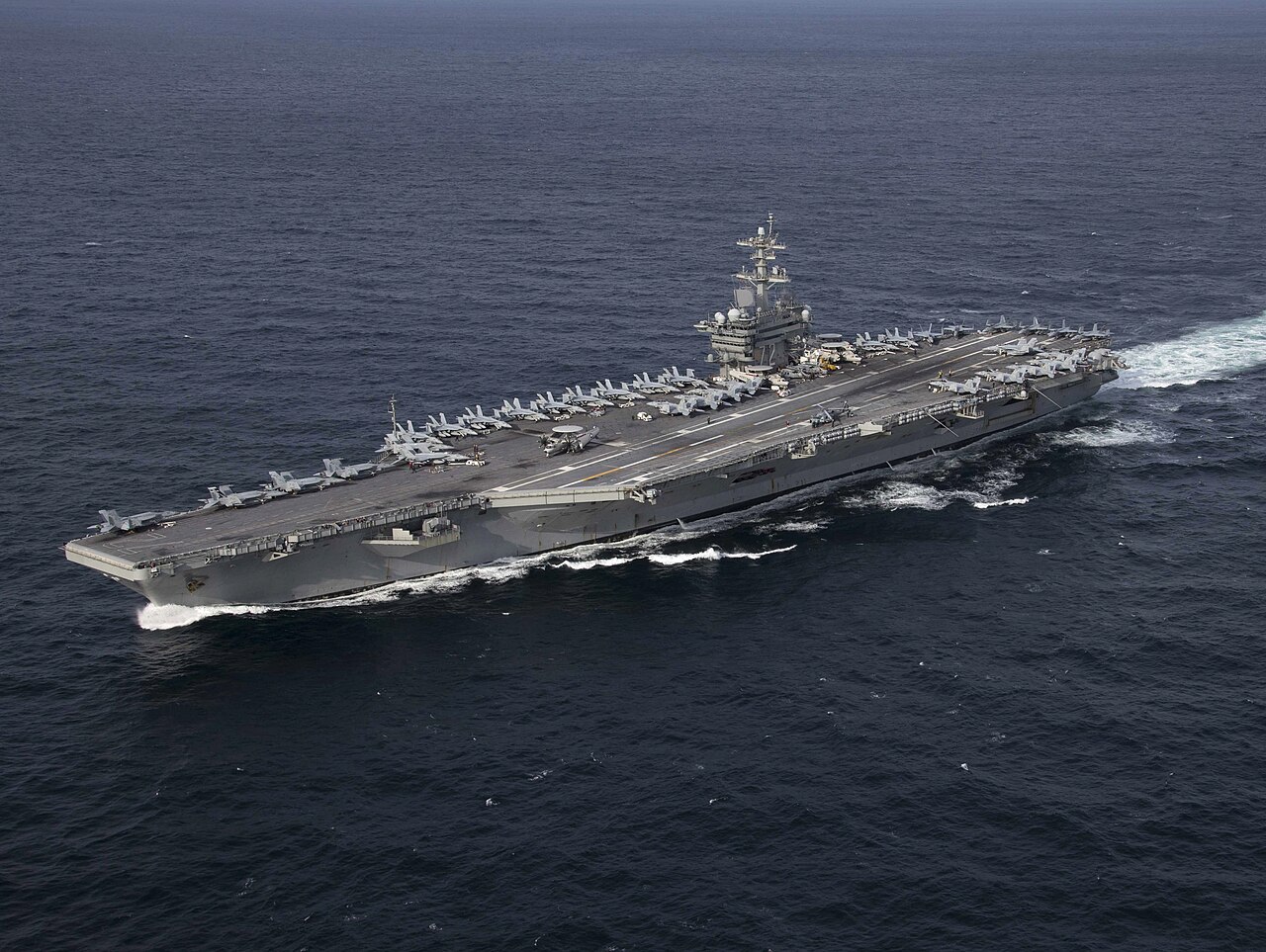 USS Abraham Lincoln can carry more than 5,000 sailors. It is equipped with nuclear capabilities and can launch 70 aircraft.
