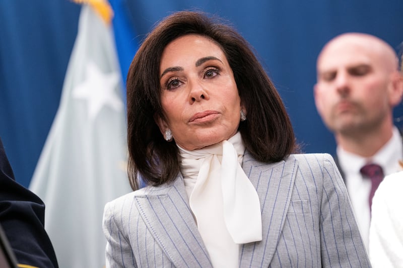 Pirro looks on while announcing charges in connection with an international car theft ring in April.
