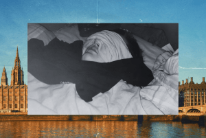 A black and white photo of a woman with severe ME is overlaid on a photo of the U.K. Houses of Parliament in London. She lays on her back in bed with a neck support and an eye mask that covers most of her face.