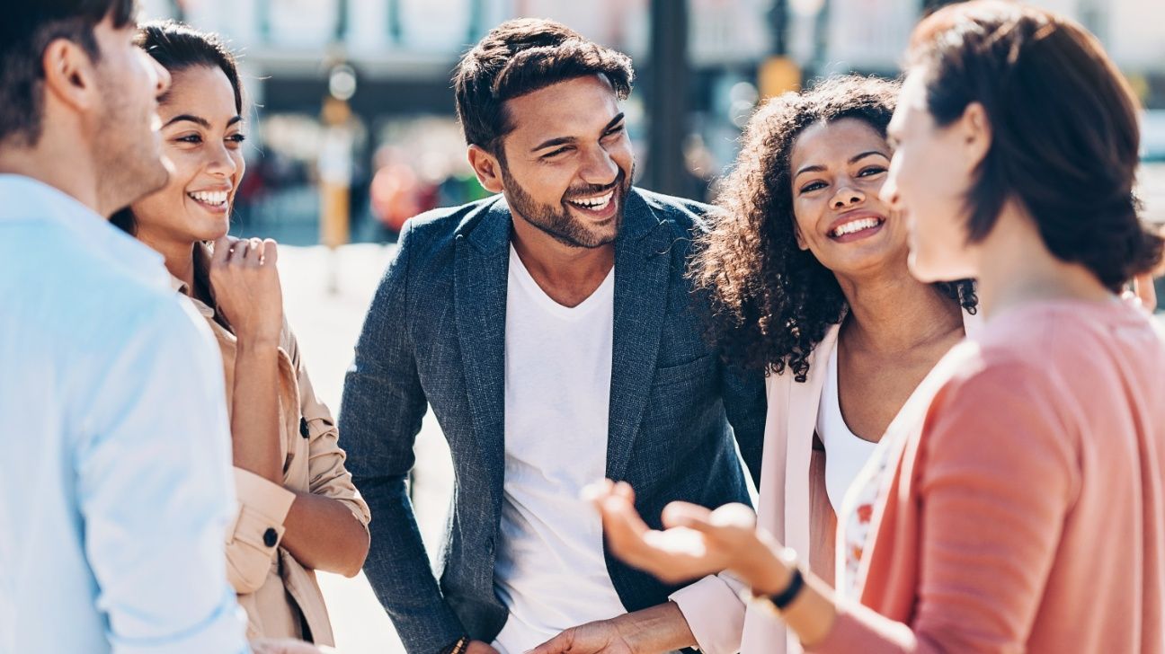 Group of young adults talking outside
