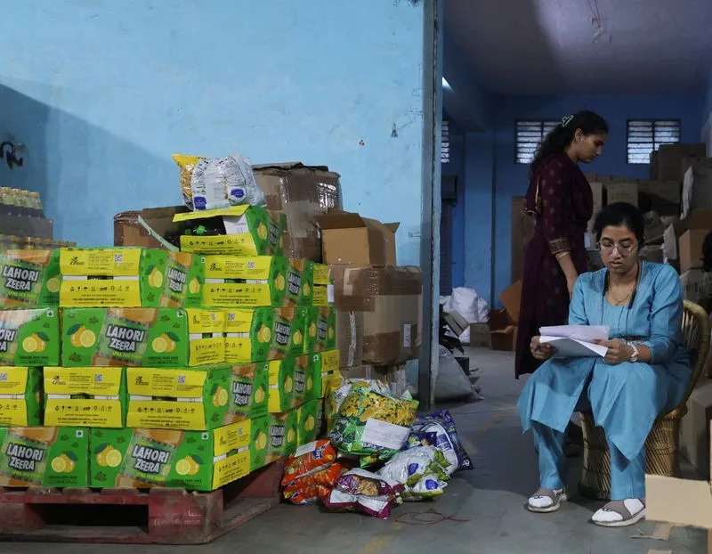 Maharashtra Food and Drug Administration officials raid a warehouse in Turbhe